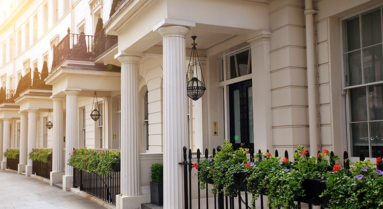 Luxury residential buildings along Grosvenor Crescent in London's Belgravia district, one of the UK's most expensive residential streets. London, England